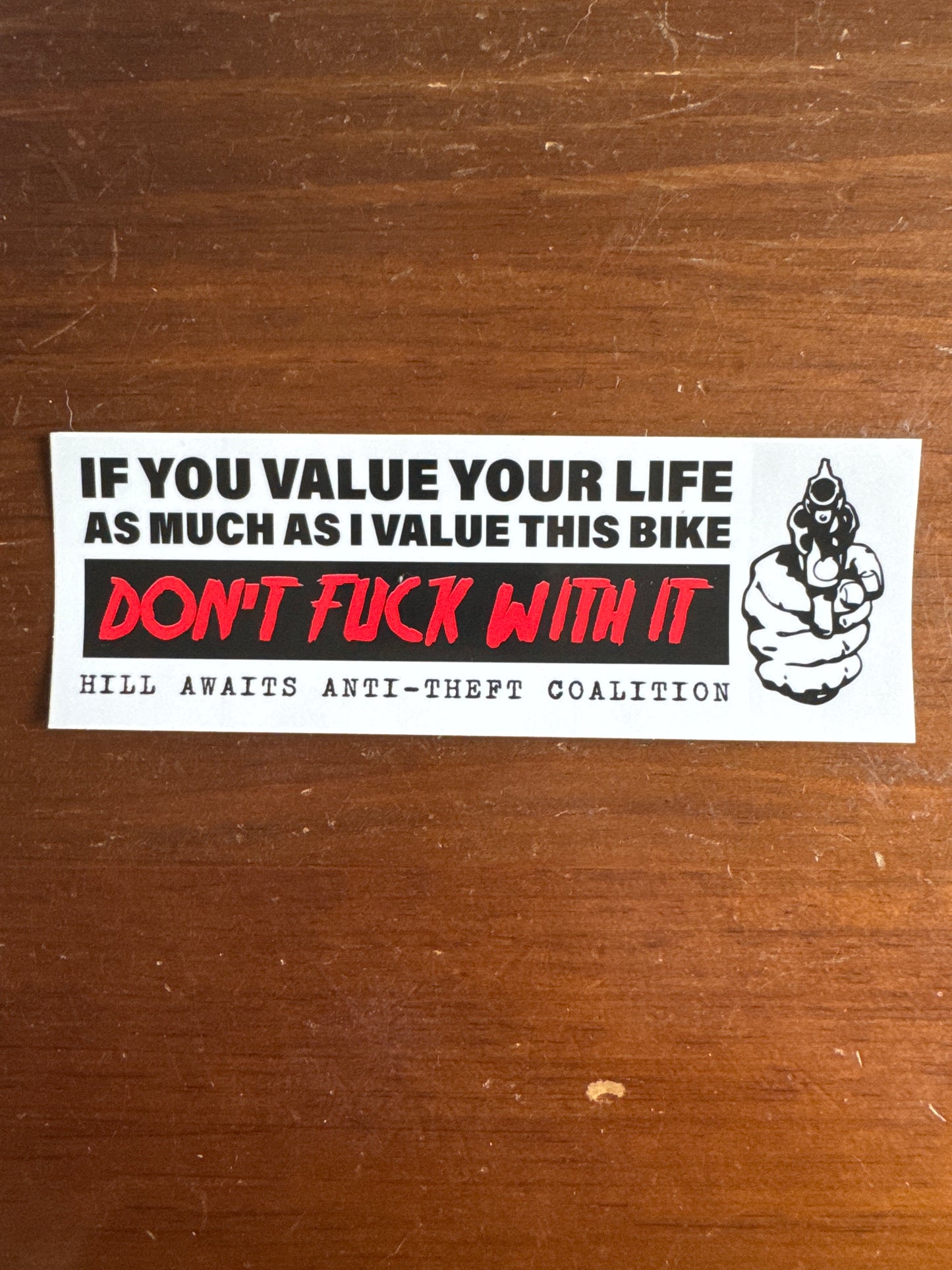 Hill awaits “Don't F with it" bumper sticker